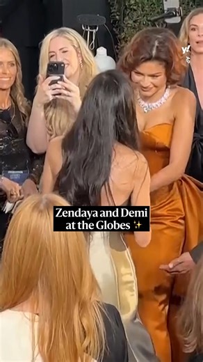Zendaya and Demi Moore share a moment on the Golden Globes red carpet. 💛 | Yahoo Entertainment