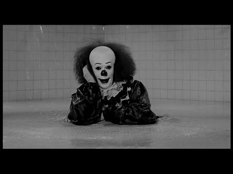 Stephen King's IT I Pennywise haunts Eddie (B&W)
